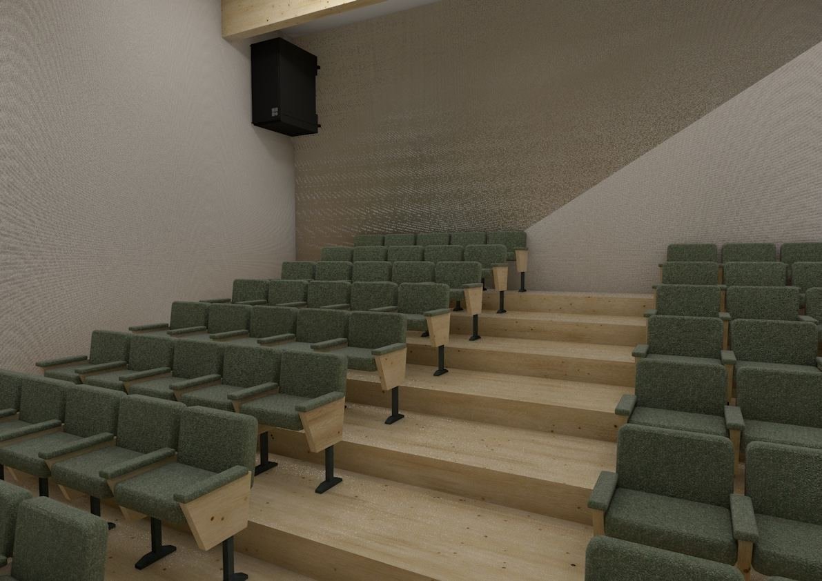 Salón de actos con butacas y paneles fonoabsorbentes